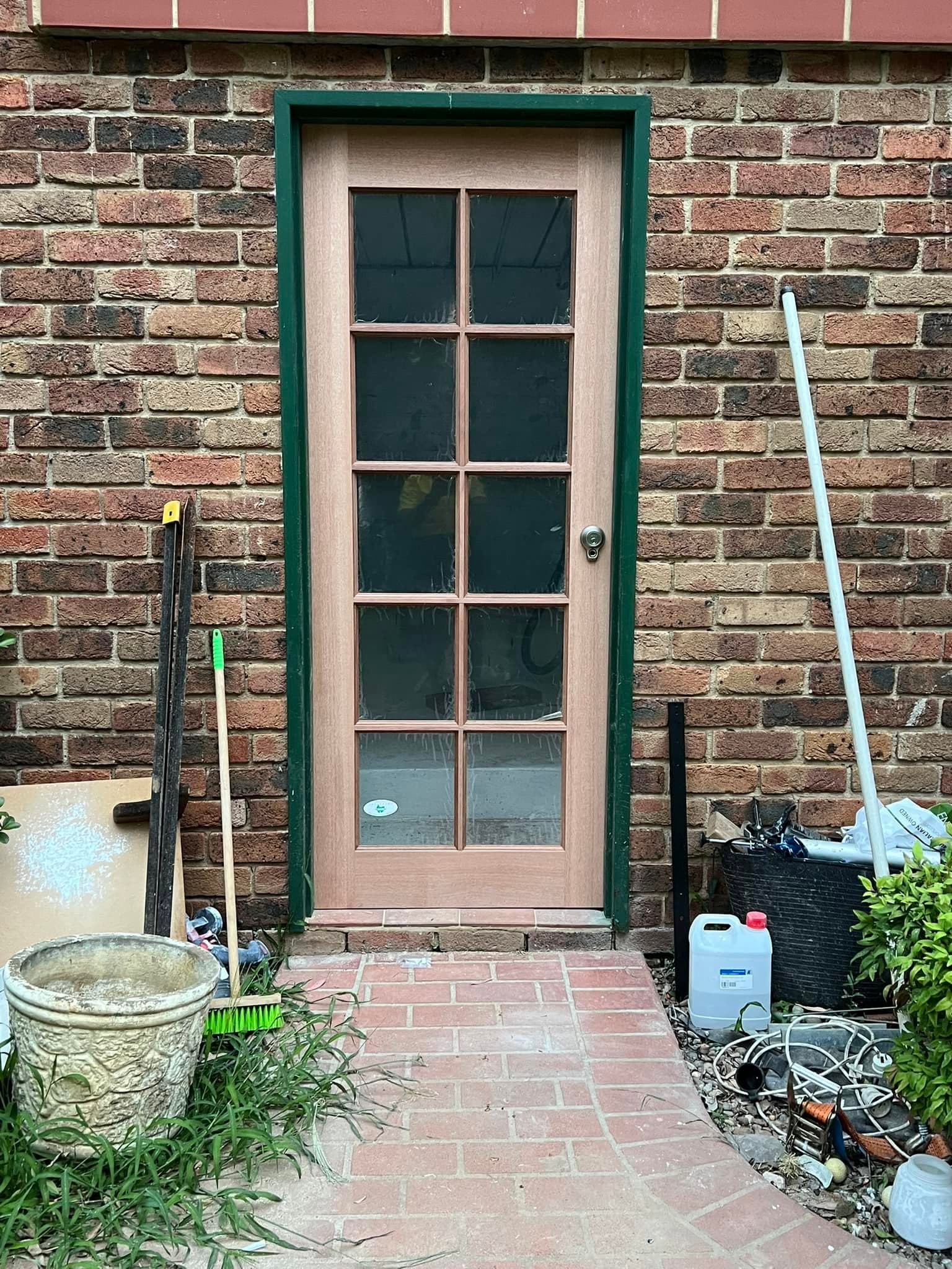 Ten-pane glazed timber door fitted