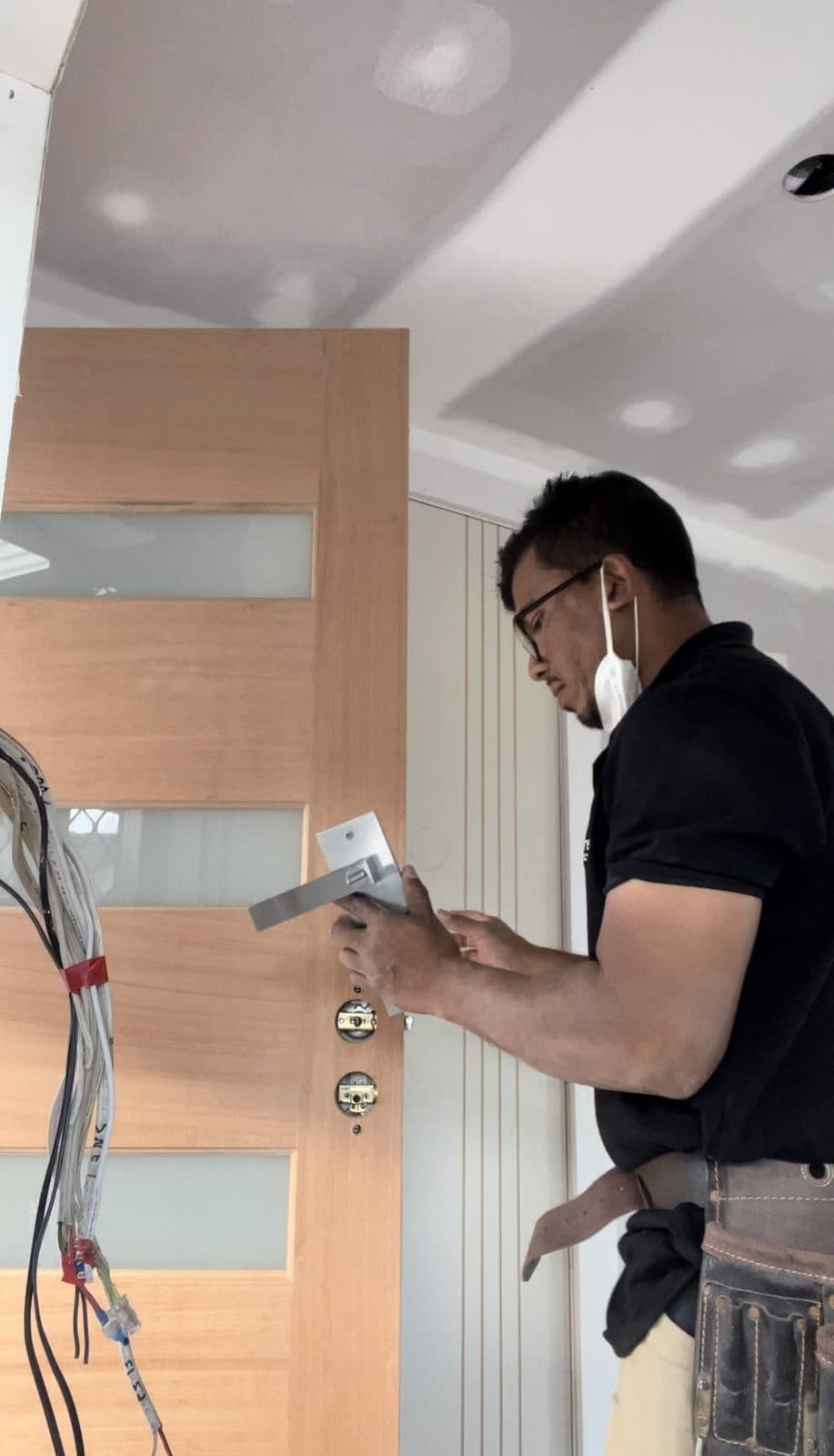 Fitting a lever handle to a timber door with frosted glass panels
