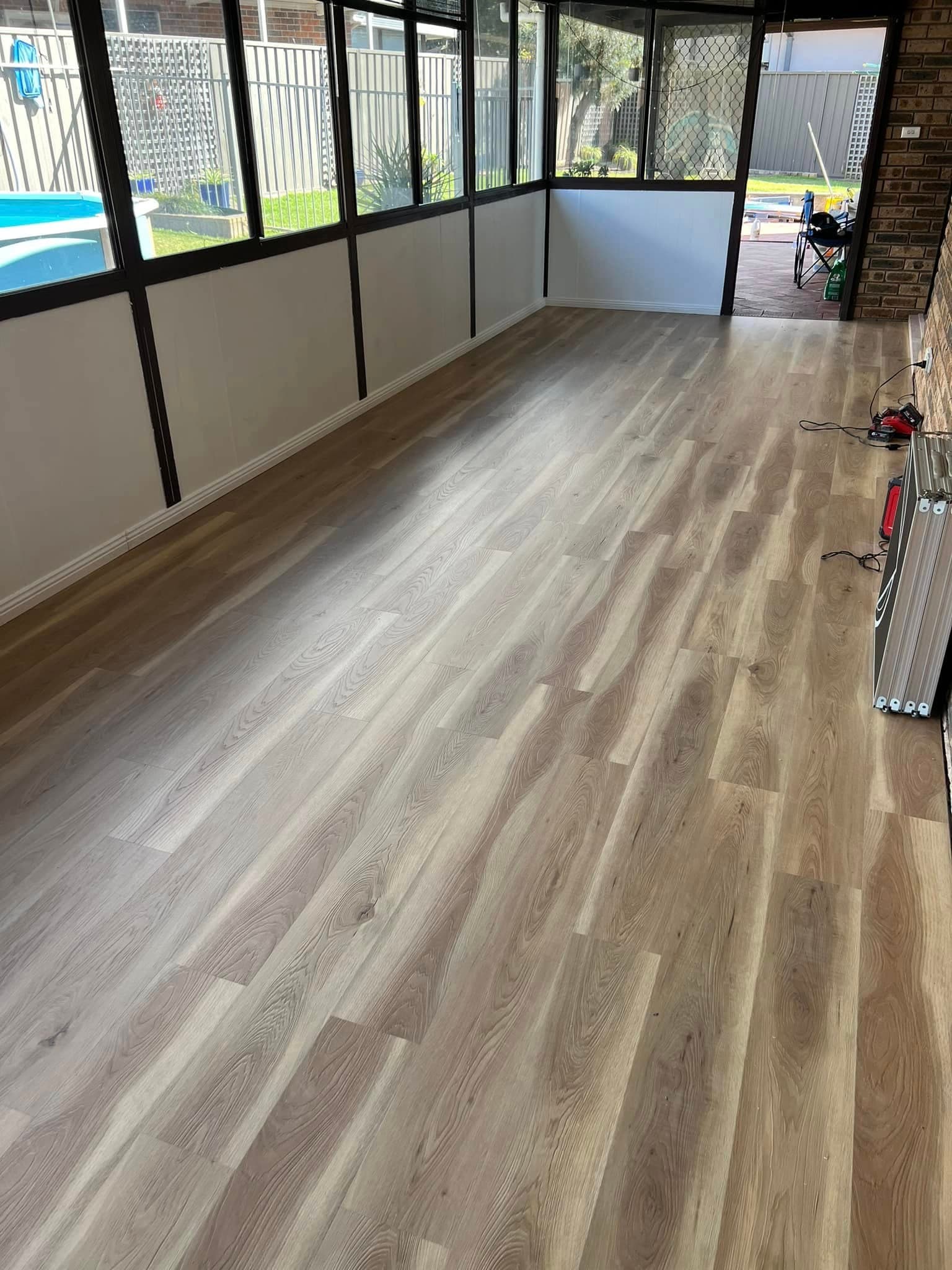 Finished laminate floor in an enclosed patio