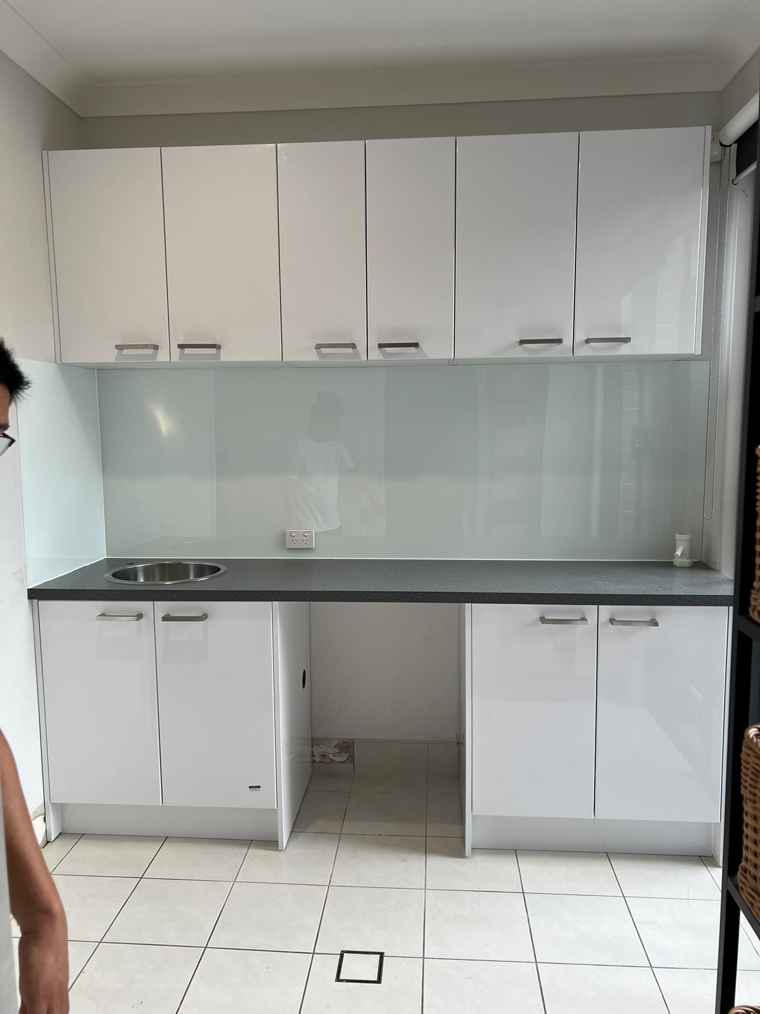 Kitchenette with a glass splashback installed