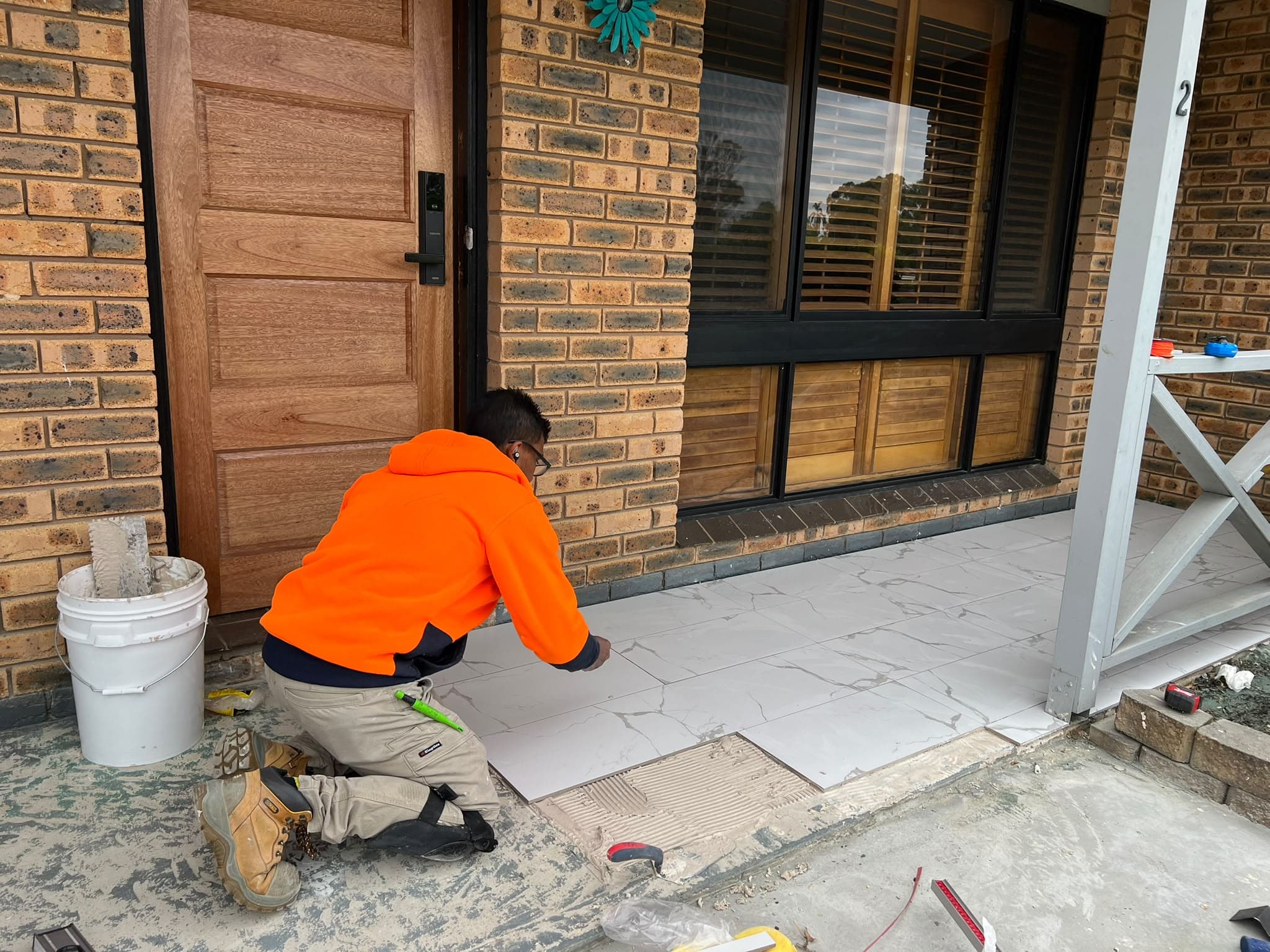 Large-format porch tiling laid